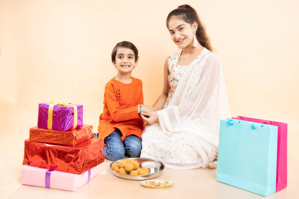 Boy giving gift to his sister at Raksha Bhandan, Stock Photo, Picture And  Royalty Free Image. Pic. PNT-PIRF-20120721-SA0835 | agefotostock